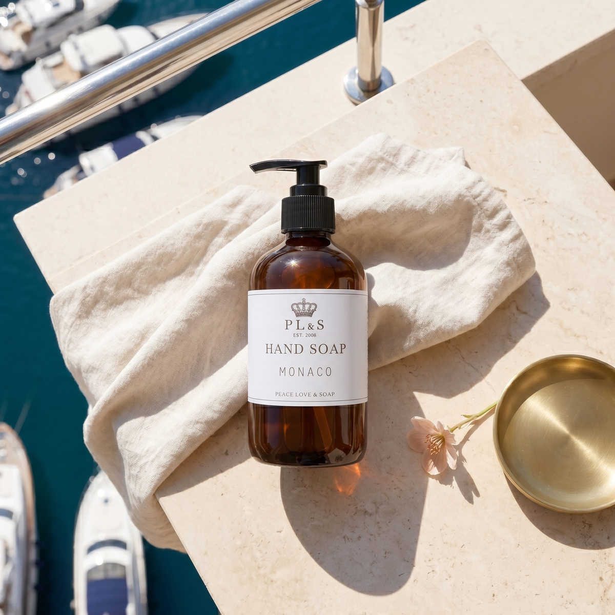 a bottle of soap on a towel