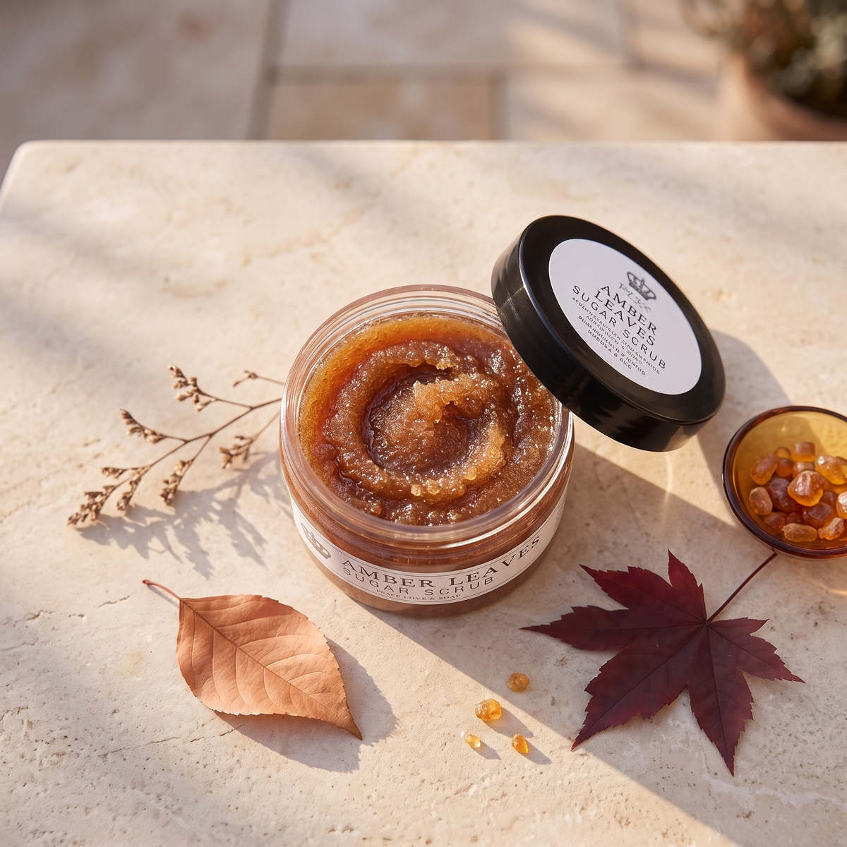 a jar of brown scrub next to a bowl of brown liquid