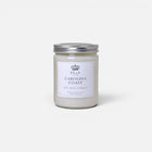 a white candle in a jar