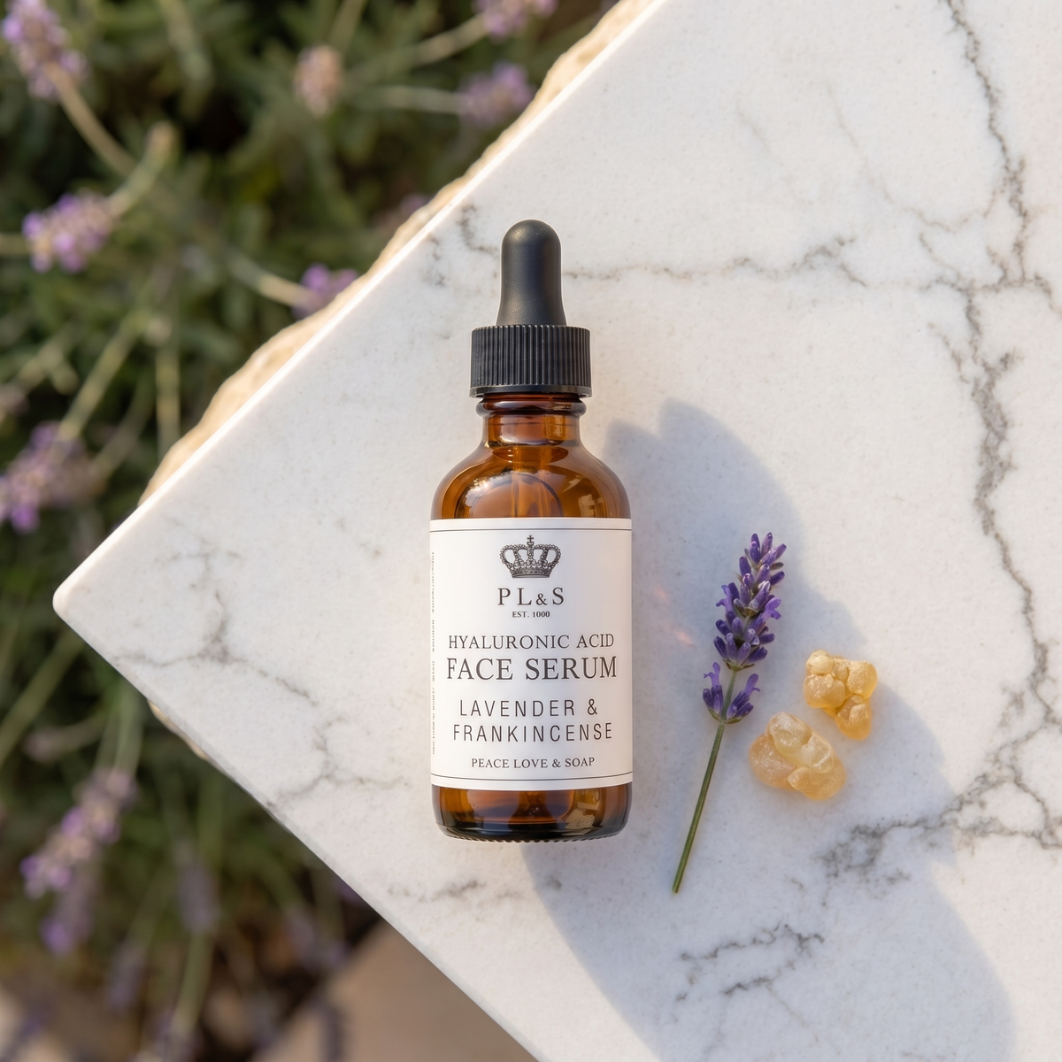 a bottle of face serum next to a flower