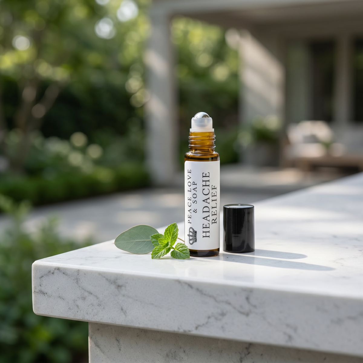 a small bottle of oil on a marble surface