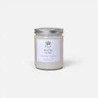 a white candle with a silver lid