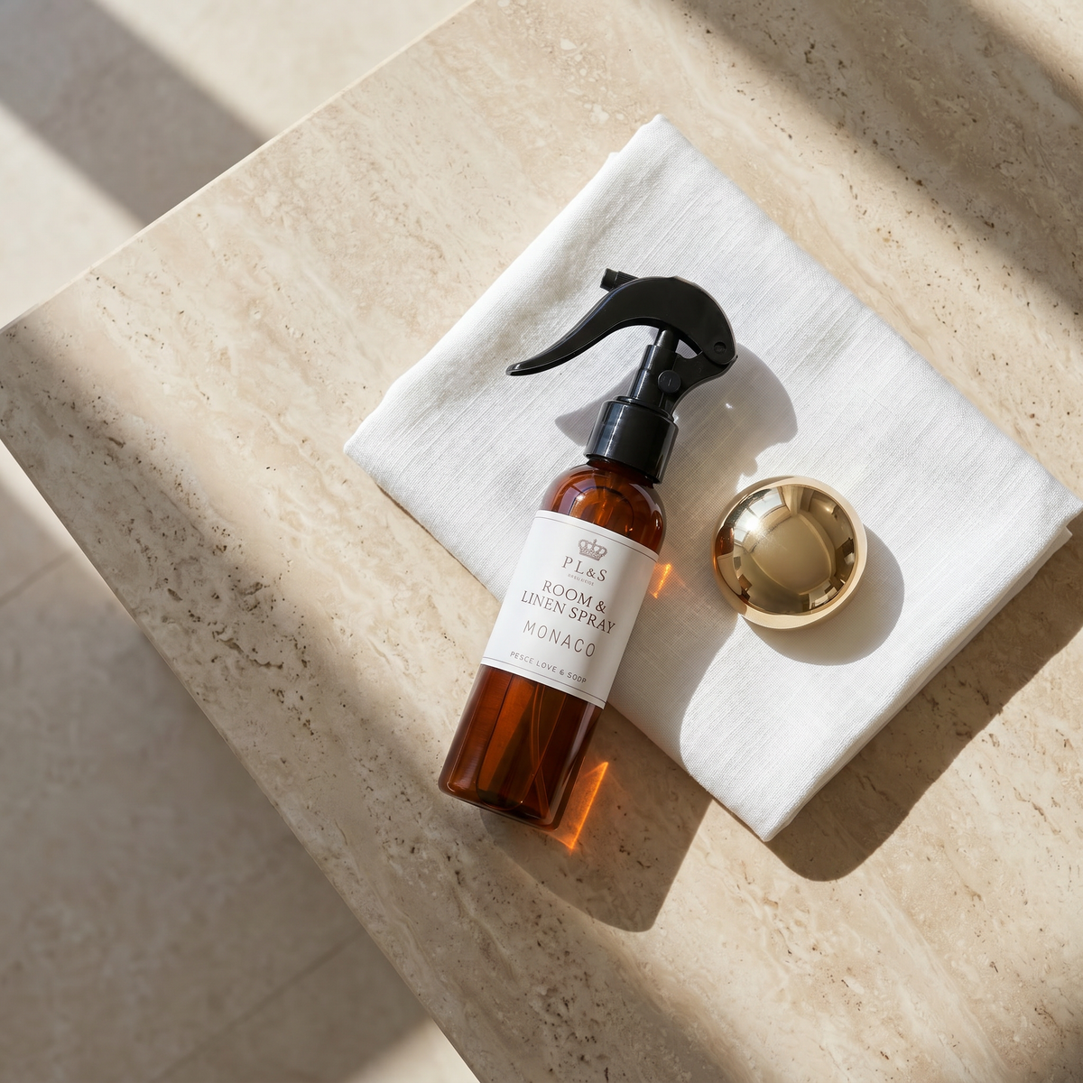 a bottle of liquid on a towel