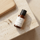 a small bottle of essential oil on a counter