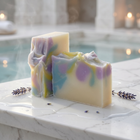 two pieces of soap on a marble surface