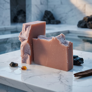 a pink soap on a marble surface