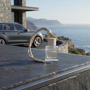 a bottle of perfume on a ledge
